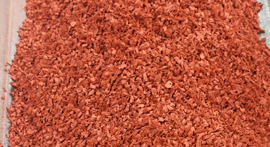 Rubber mulch colored red